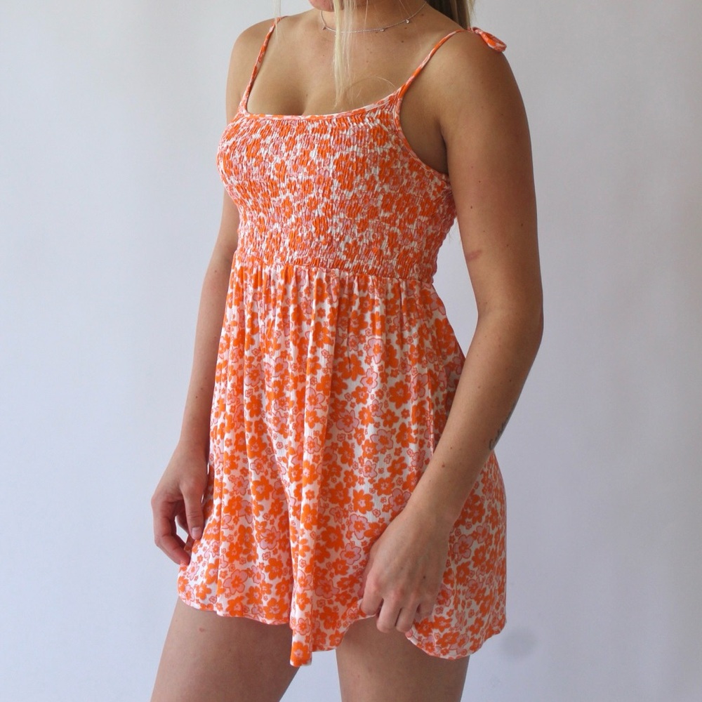 Pink and orange floral romper